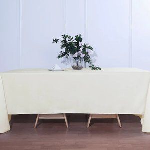 90"x132" Ivory Seamless Polyester Rectangular Tablecloths